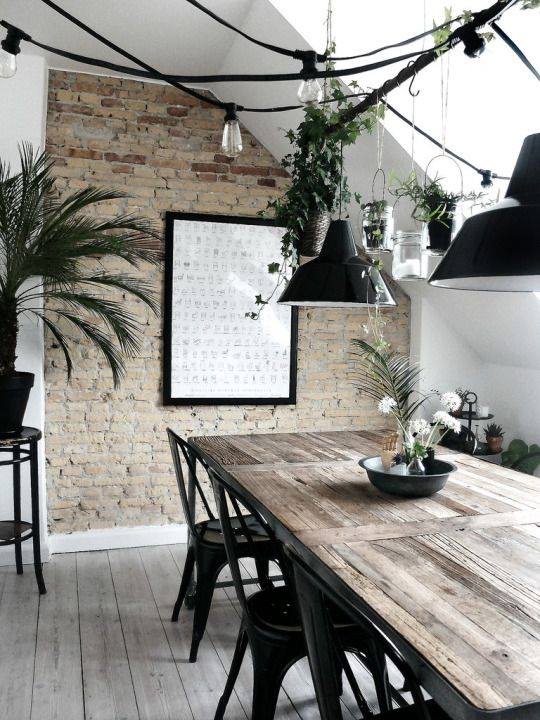 Rustic Dining Room Decor With Brick Wall And Some Indoor Plants