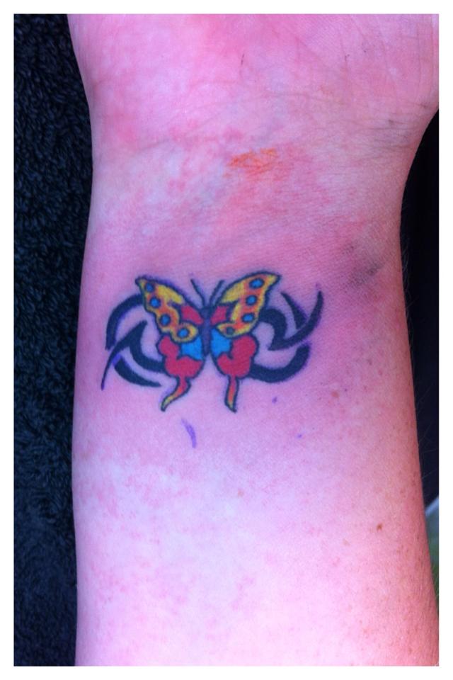 Small Butterfly With Tribal Inside Wrist
