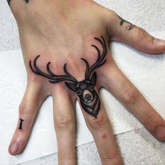 Stunning Dear Finger Tattoo