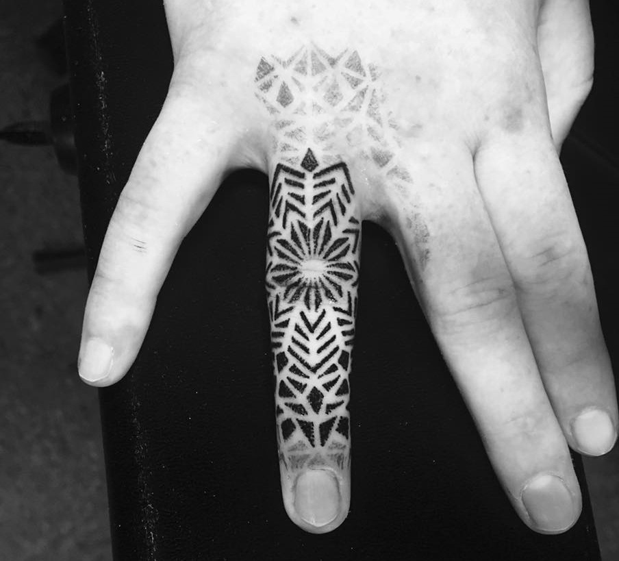 Stunning Ring Finger Tattoo