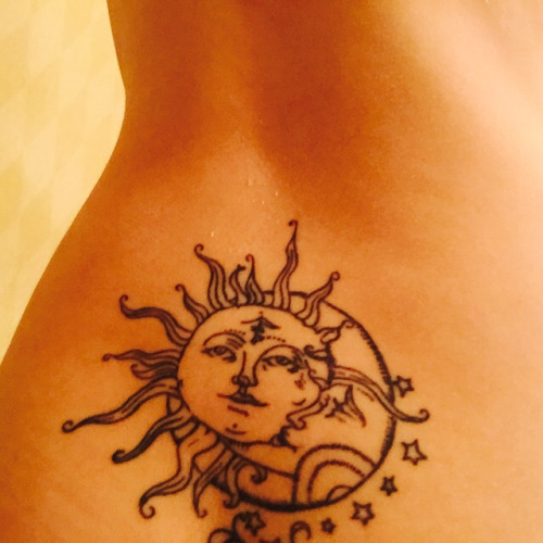 Sun Moon Lower Back Tattoo