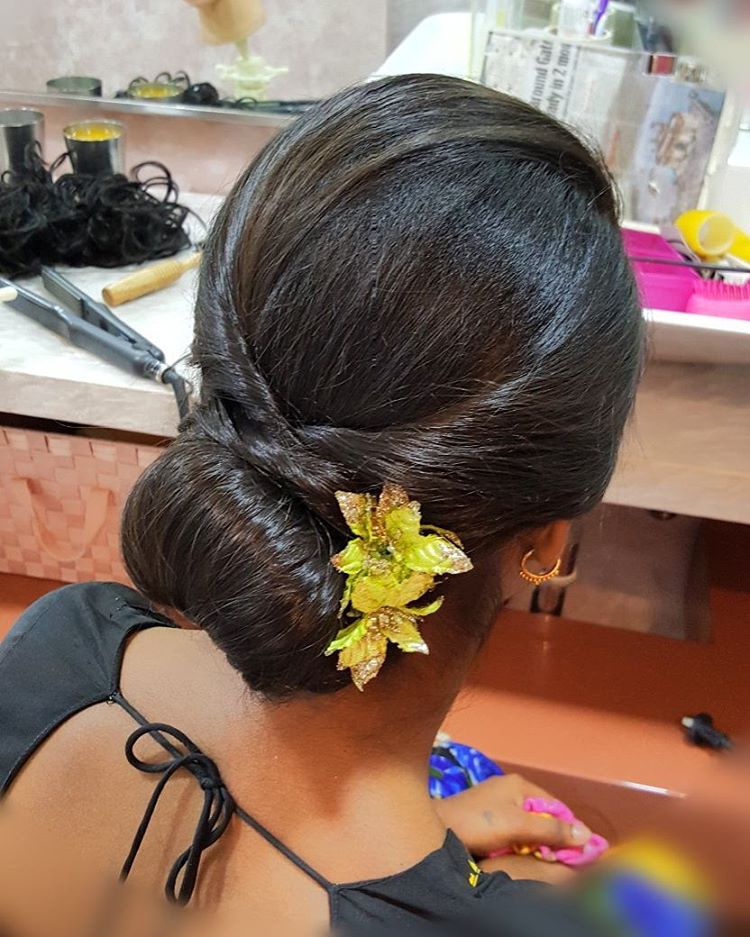 Twisted Hair Bun With Flowers