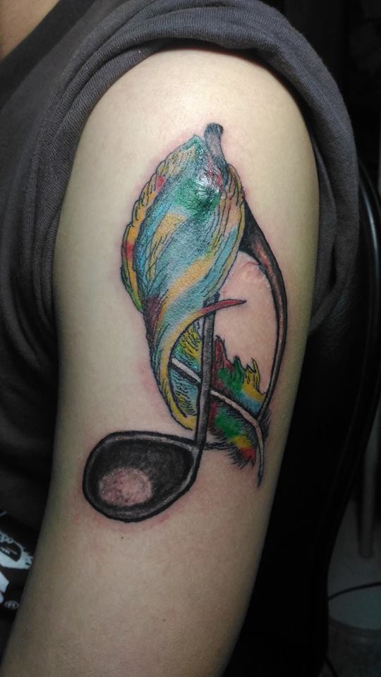 Unique Feather Tattoo