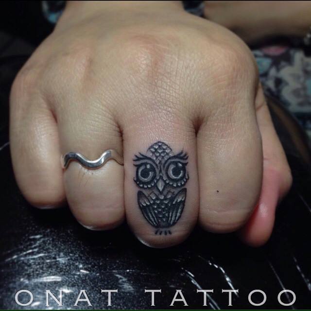 Adorable Small Piece Owl Tattoo On Finger
