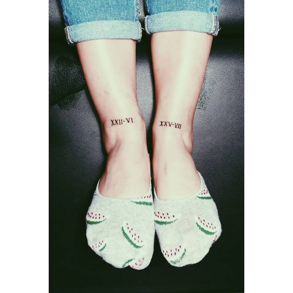 Designer Roman Numerals Inkked On Both Foots