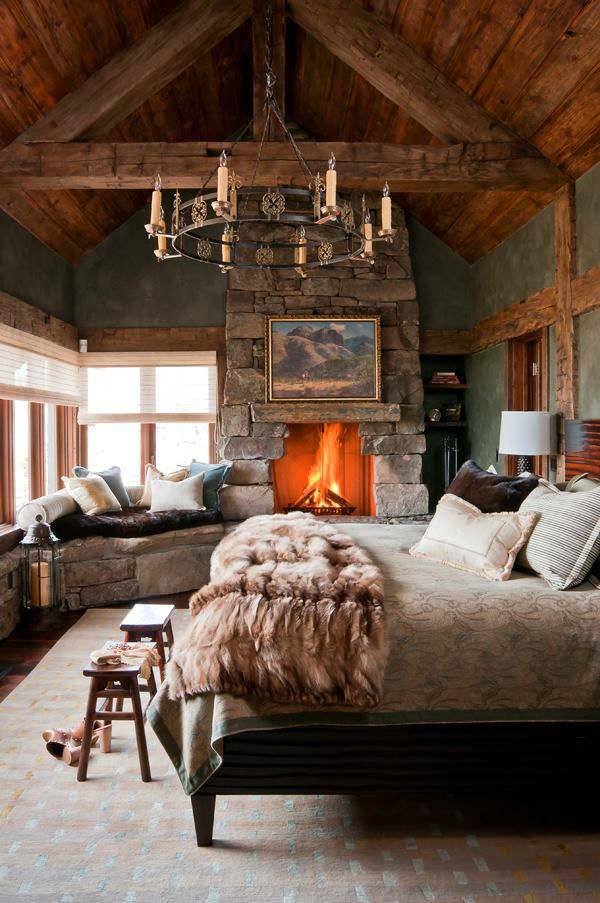 Fabulous Rustic Bedroom With Beautiful Chandelie, Floor And Beams, Nightstand Lamp And Fire space
