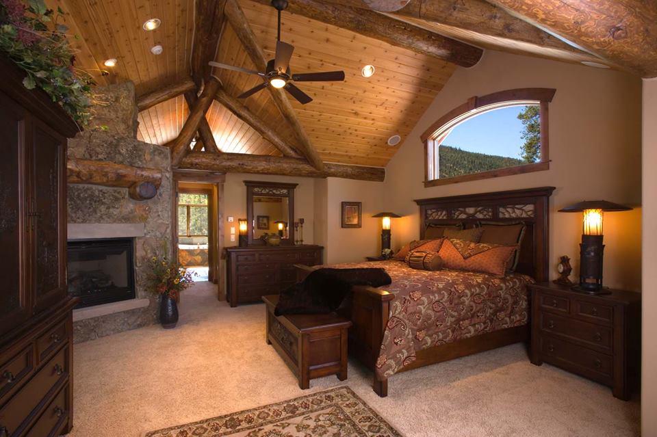 Incredible Rustic Bedroom With Natural View, Bamboo & Beam Ceiling, Stone Wall, Table Lamp And Fire Place