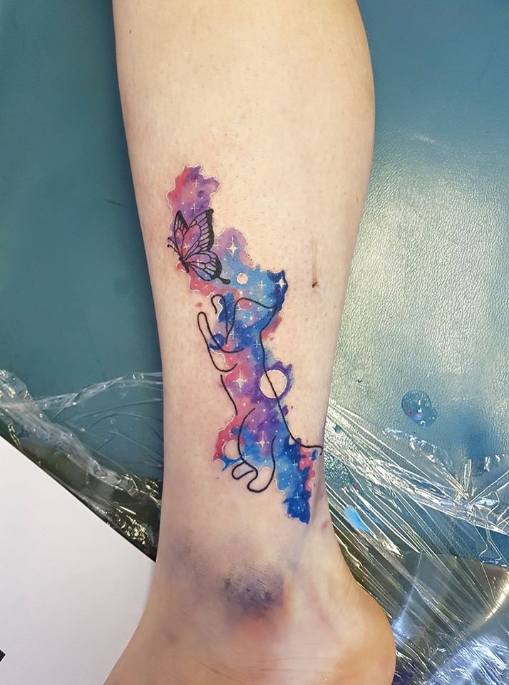 Little Galaxy Cat Tattoo With Butterfly On Lower Leg