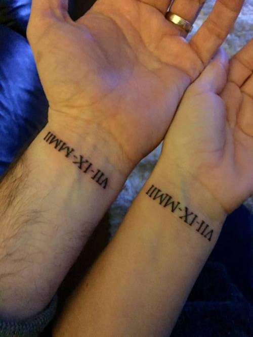 Matching Couple Roman Numerals Tattoo