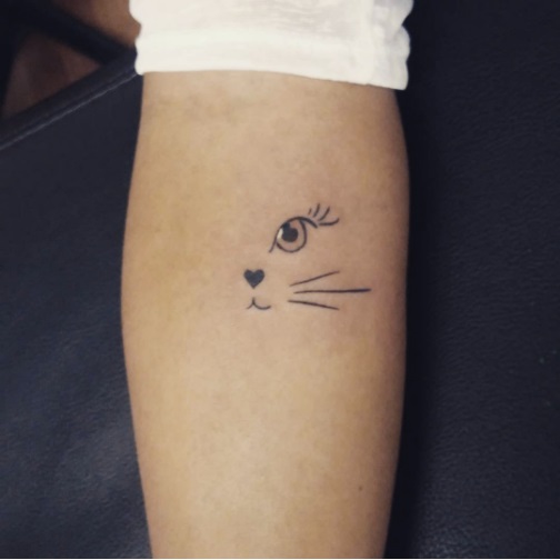 Minimalist Feline Tattoos