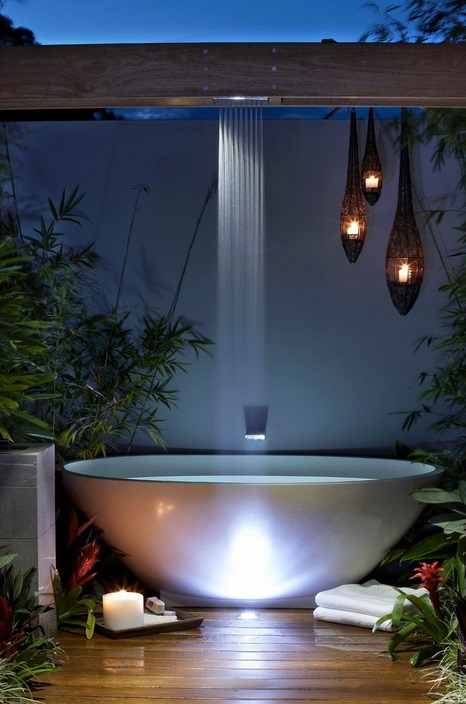 Modish Rain Shower Design With Beautiful Candles, Plants, Lights And Bath Tub