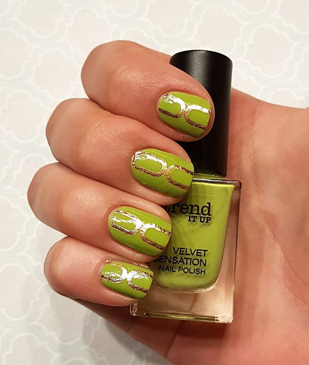 Trendy Green And Golden Nails