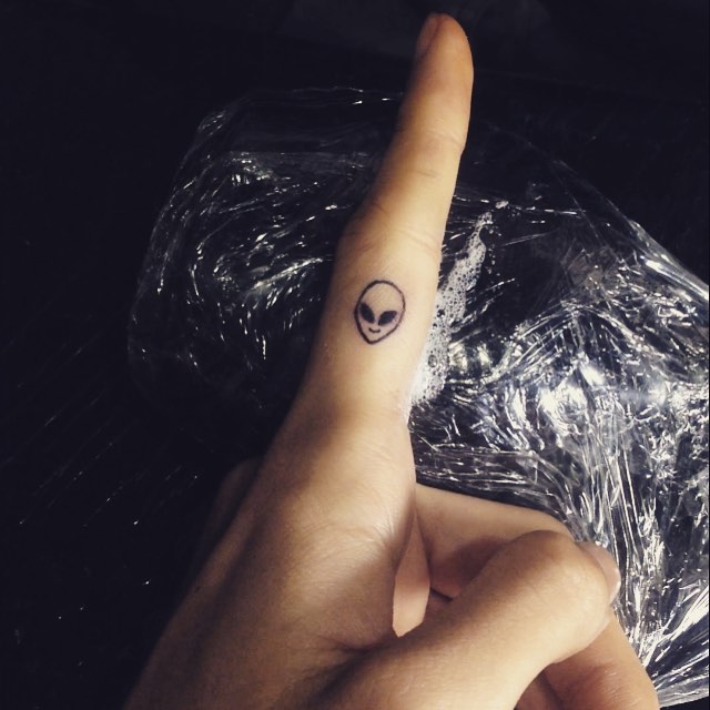 Cool Alien Minimalist Tattoo On Finger