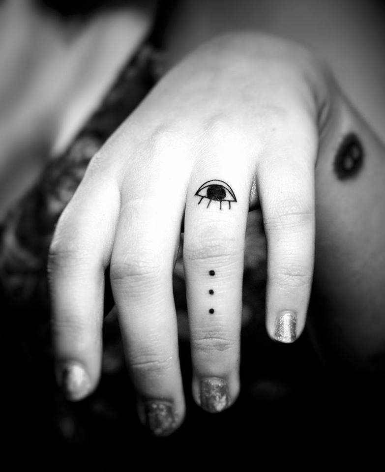 Dot Work Black Tattoo On Finger