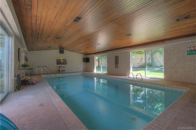 Elegant Swimming Pool With Rustic Ceiling Design