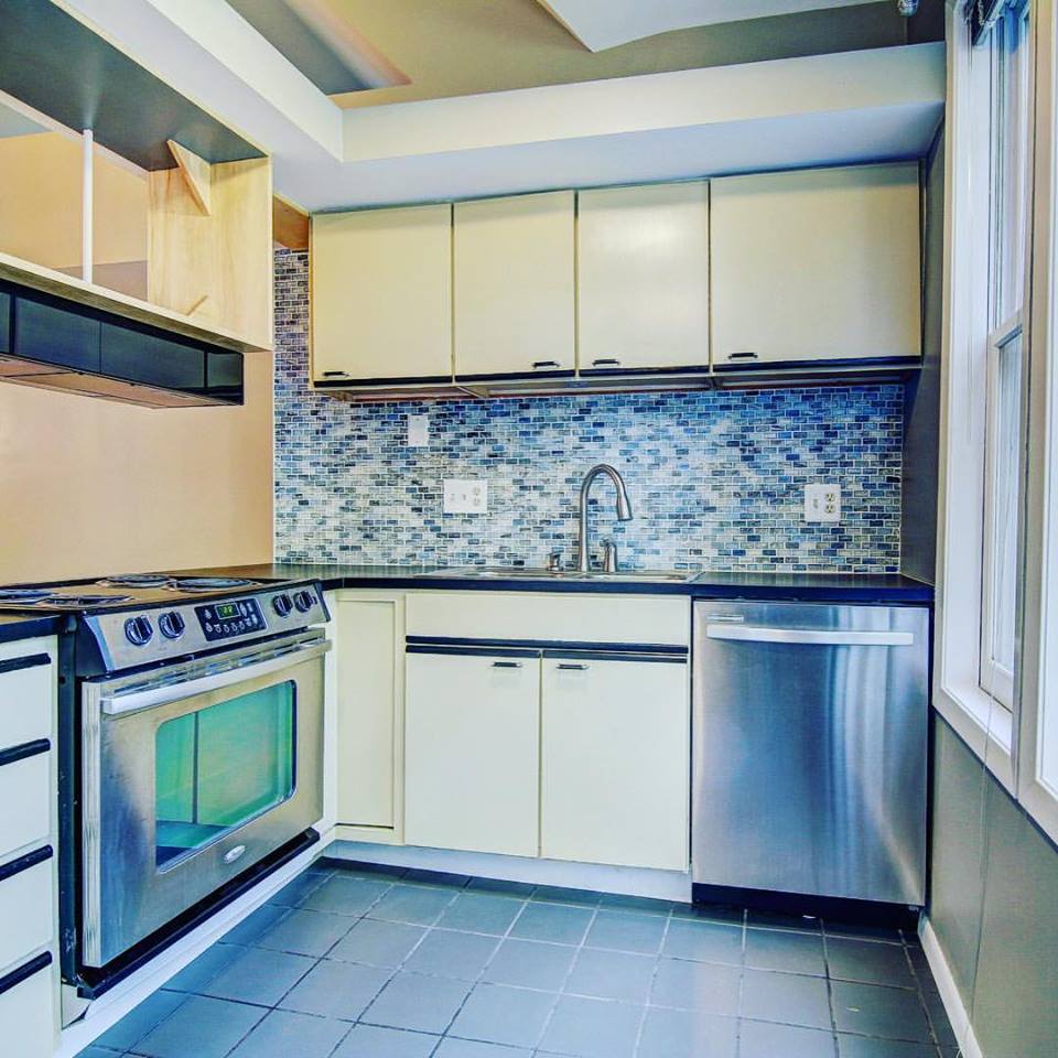 Graceful Modern Touch Retro Kitchen With Modern Appliances, Beautiful Tiles & Yellow Cabinets