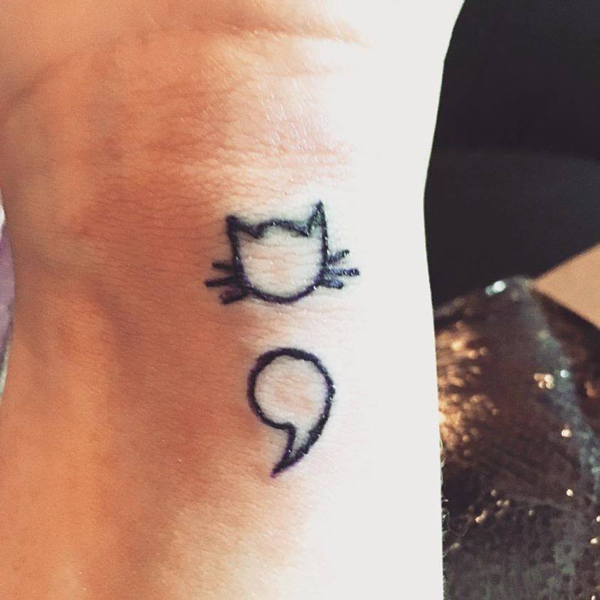 Kitty With Semi Colon Minimalist Tattoo On Wrist