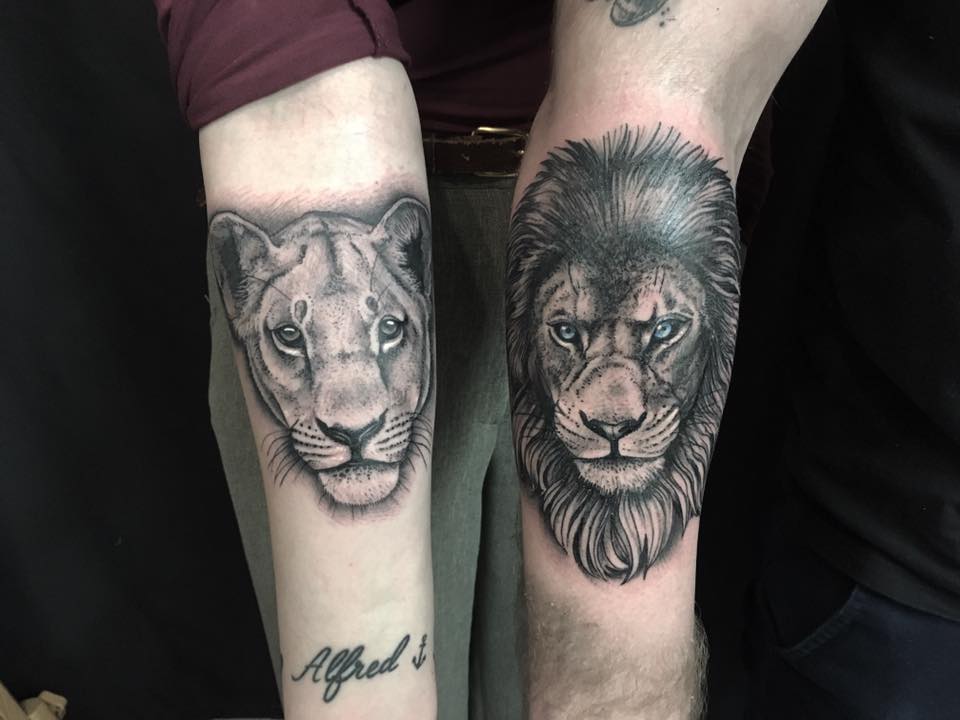 Lion And Lioness Sibling Tattoo On Arm.