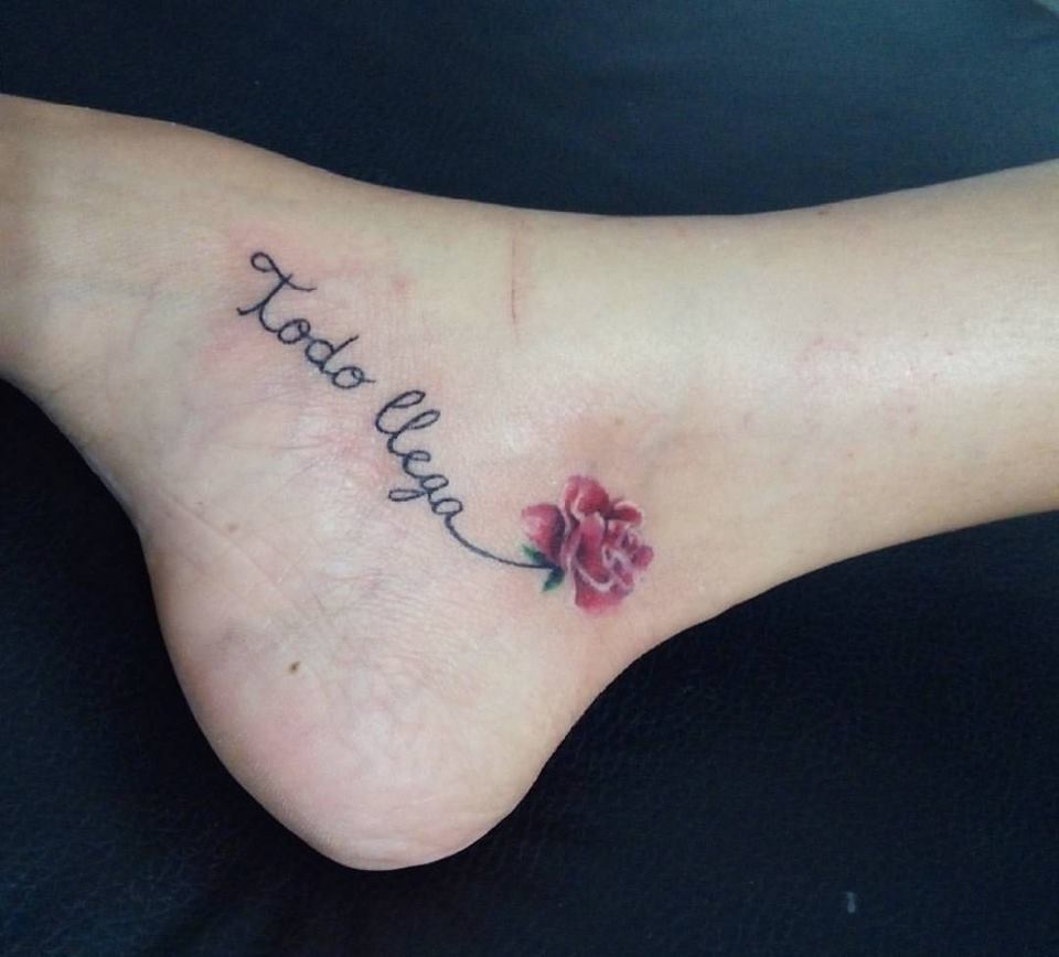 Lovely Flower With Words Inked On Ankle