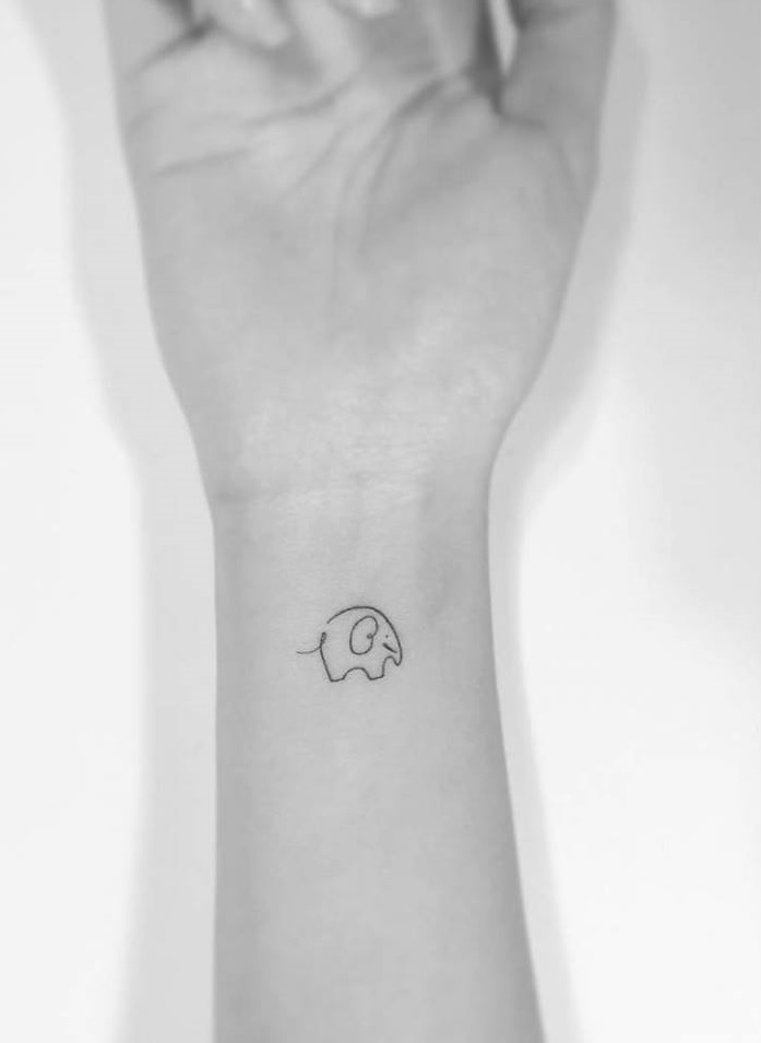 Minimalist Elephant Tattoo On Inner Wrist