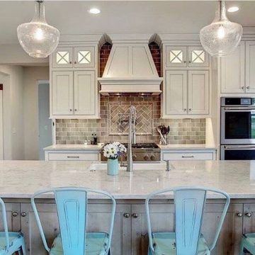 Stunning Kitchen Island With Blue Chairs And Beautiful Lights