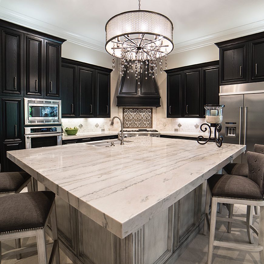 Stylish White Macaubus Island In This Kitchen With Beautiful Chandelier
