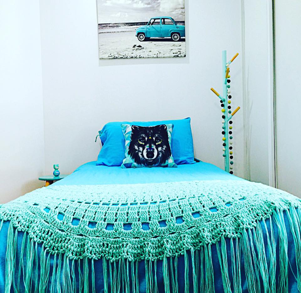 Turquoise Crochet Tassel And Wolf Print Pillow