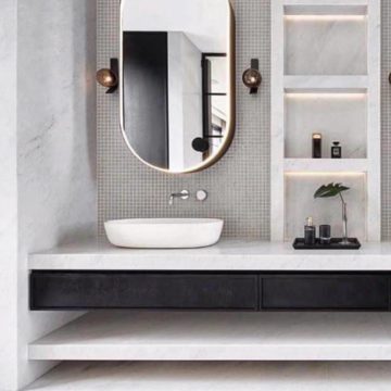 Wonderful Black & White Bathroom With Awesome Sink And Golden Boundry Mirror
