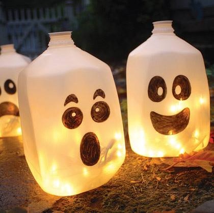 Empty Bottles Used To Decor On Halloween By Drawing Face With Black Marker