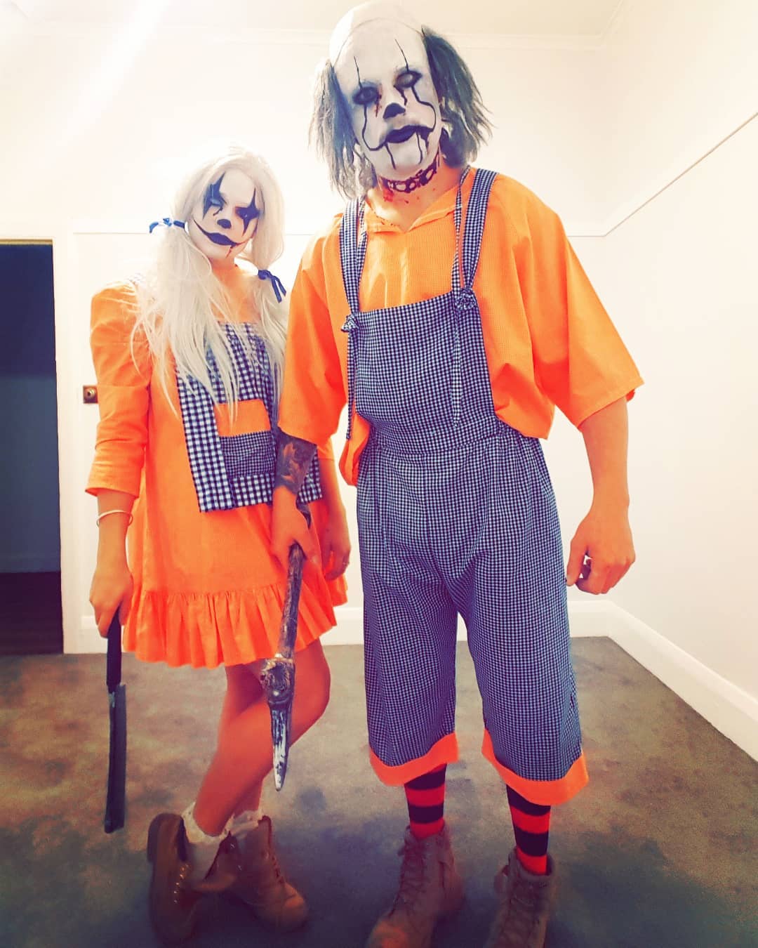 Evil clown couple ready for Halloween party. Pic by celestegoullet