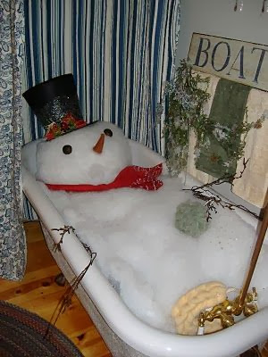 Fabulous snowman in bathtub.
