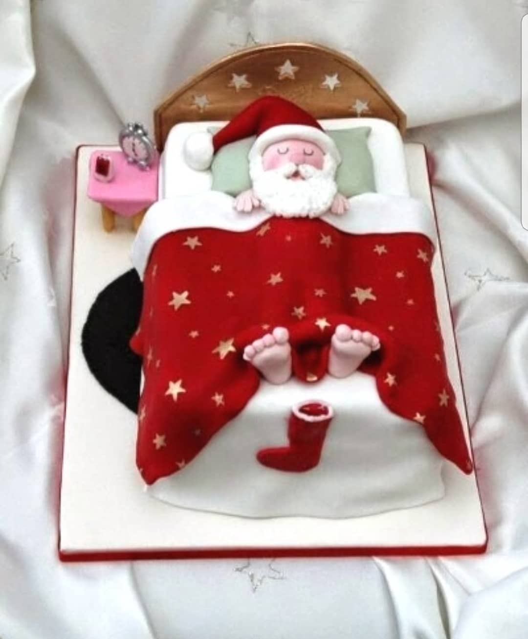 Sleeping Santa cake. Pic by christmasuglysweater