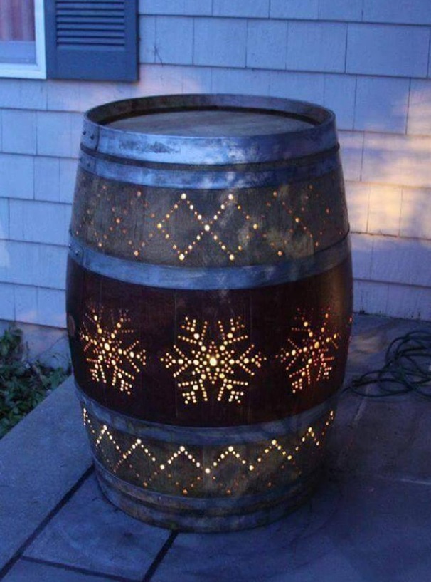 Wine Barrel Is Tured In Outdoor Decor With Lights