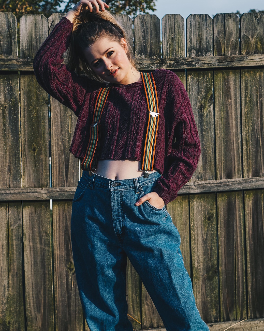 Chic Handmade Cropped Sweater Paired With Baggy Jeans And Funky Belts