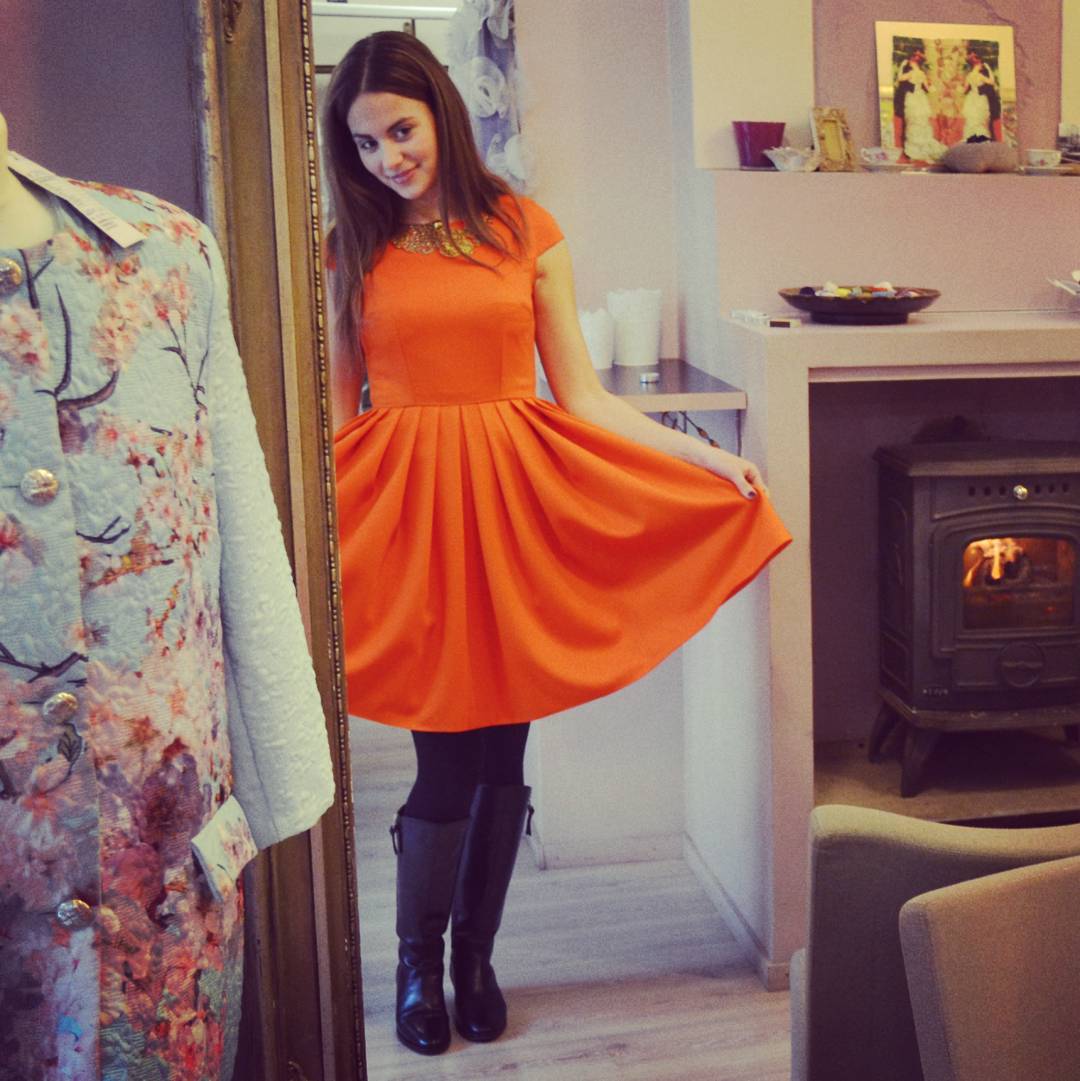Cute Orange Dress With Black Stockings And Leather Knee Shoes
