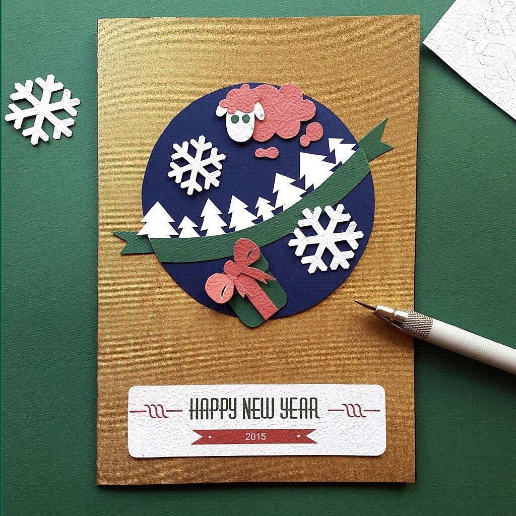Ravishing New Year Card Bu Using Paper Cuttings