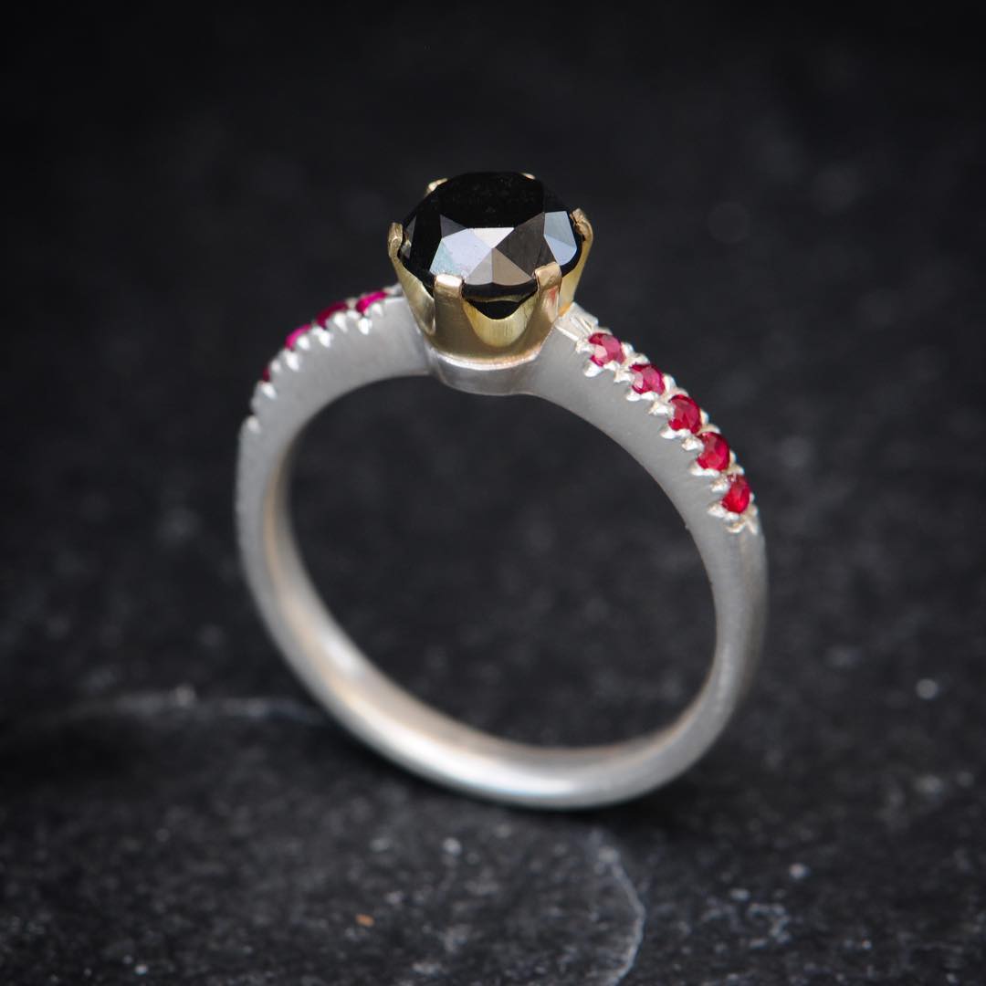 Attractive Black Diamond Ring With Small Pink Diamonds