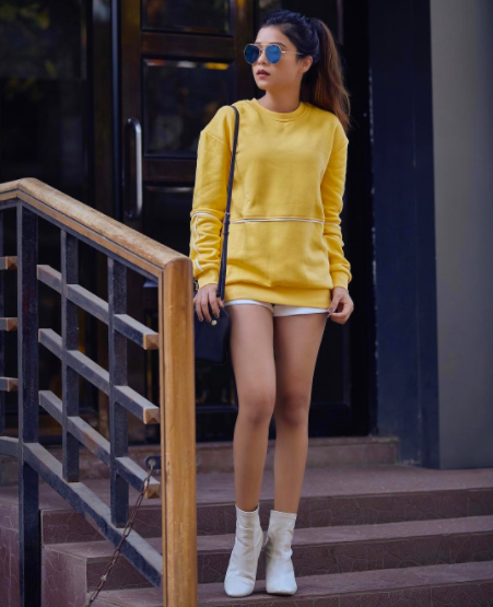 Dashing Yellow Sweatshirt With White Ankle Length Shoes