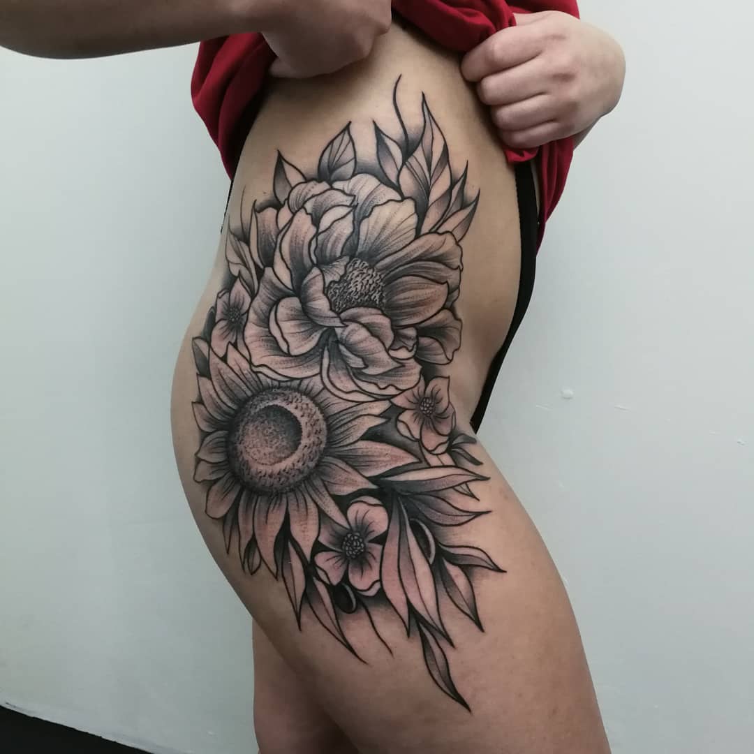 Adorable Black & Grey Flower Hip Tattoo