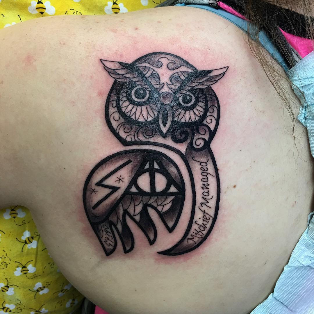 Adorable Harry Potter Symbols In Shape Of Owl Tattoo On Back Shoulder