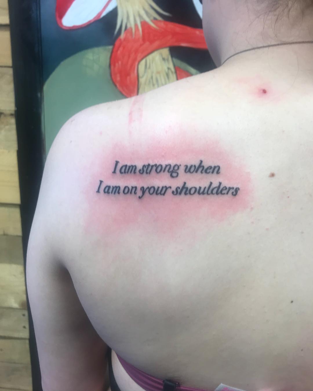 Alluring Small Quote Tattoo on Back Shoulder