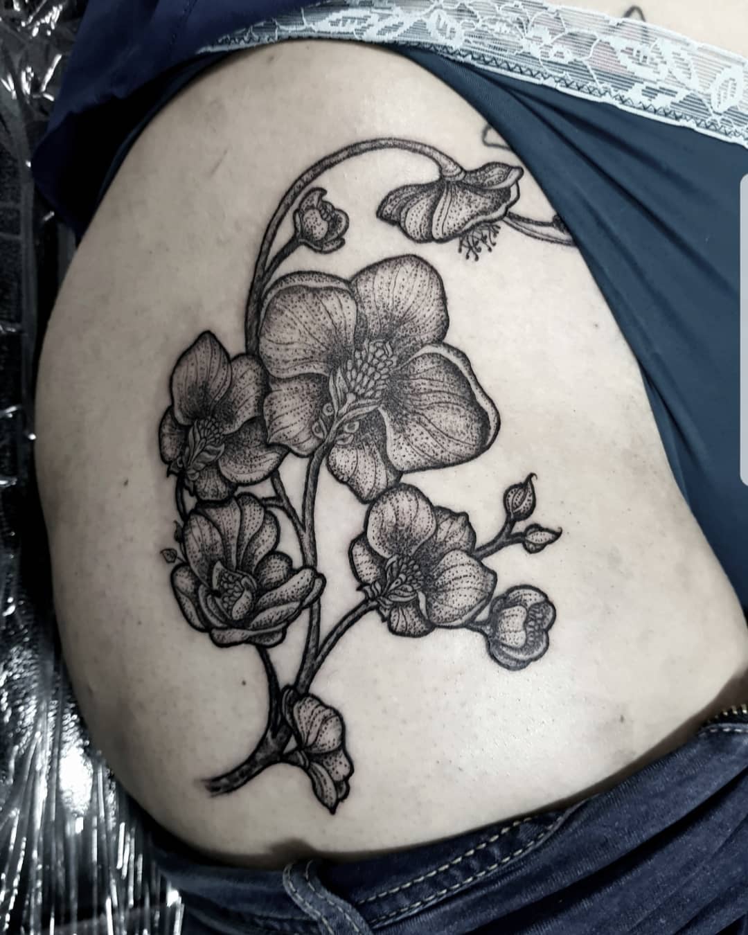 Black Orchid Branch Hip Tattoo