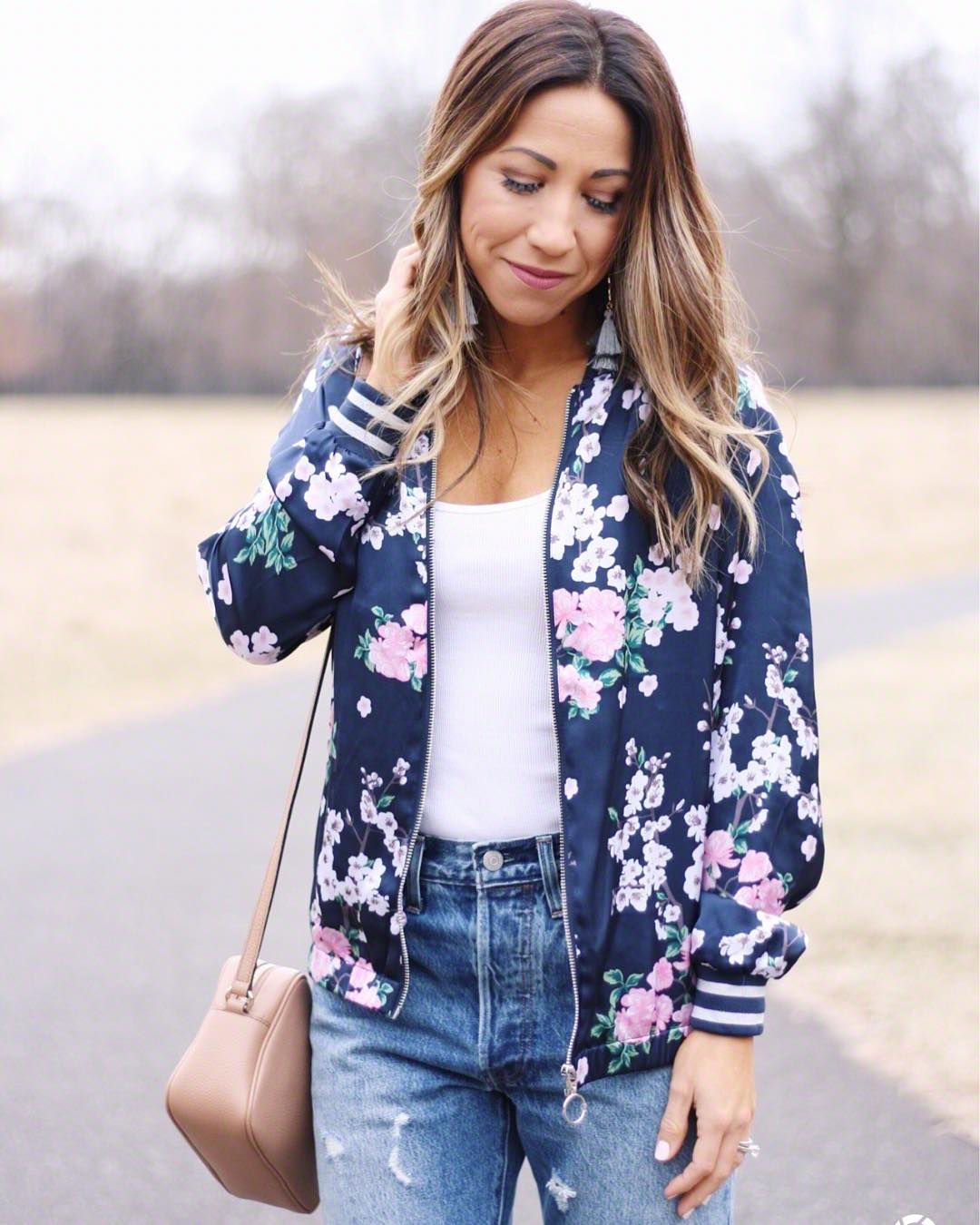 Bomber Jacket Paired With Denim Jeans