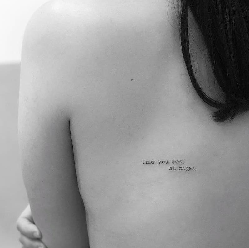 Contemporary Single Needle Tattoo On Back