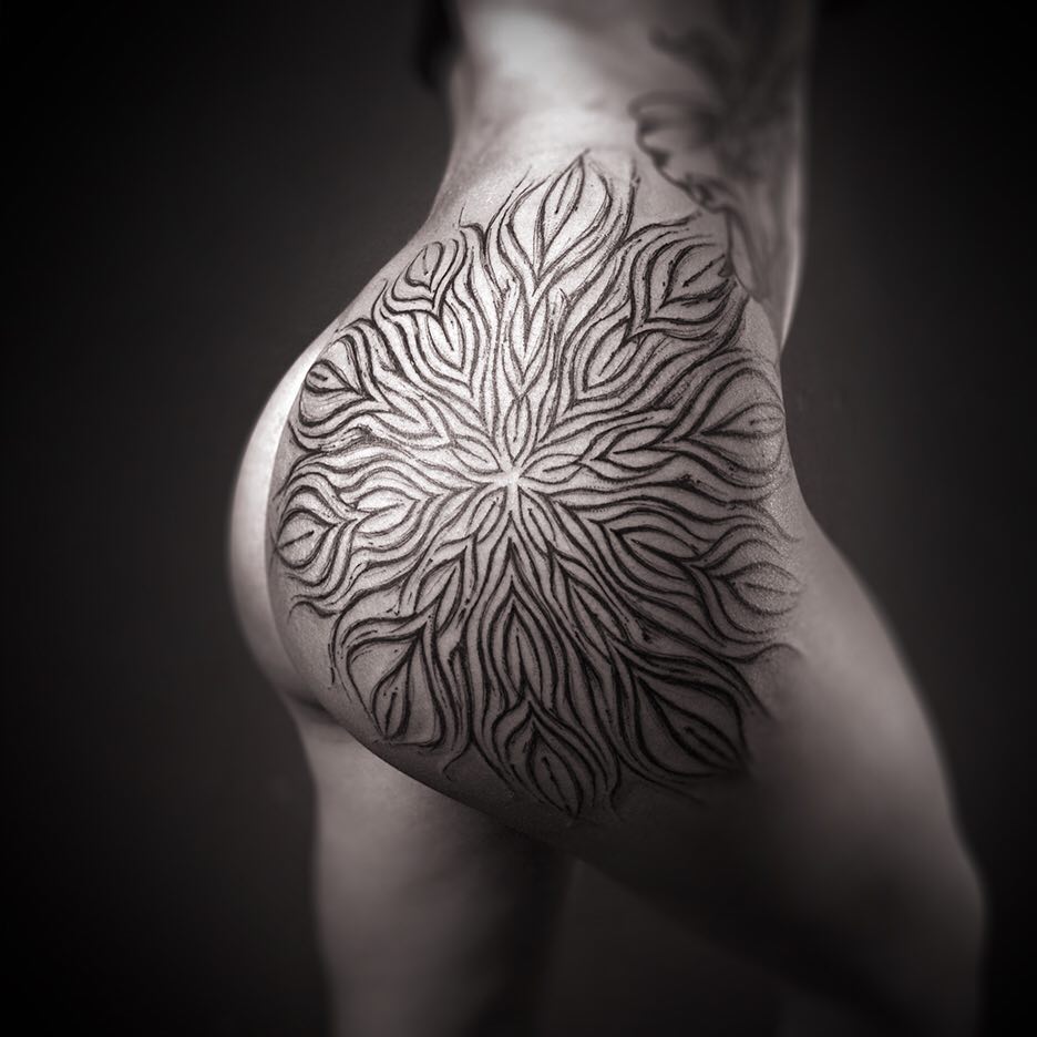 Dynamic Black Dot And Line Work Tattoo On Hip.