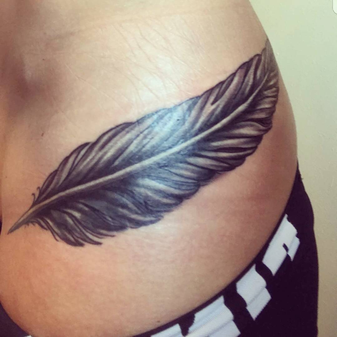 Feather Cover Up Hip Tattoo