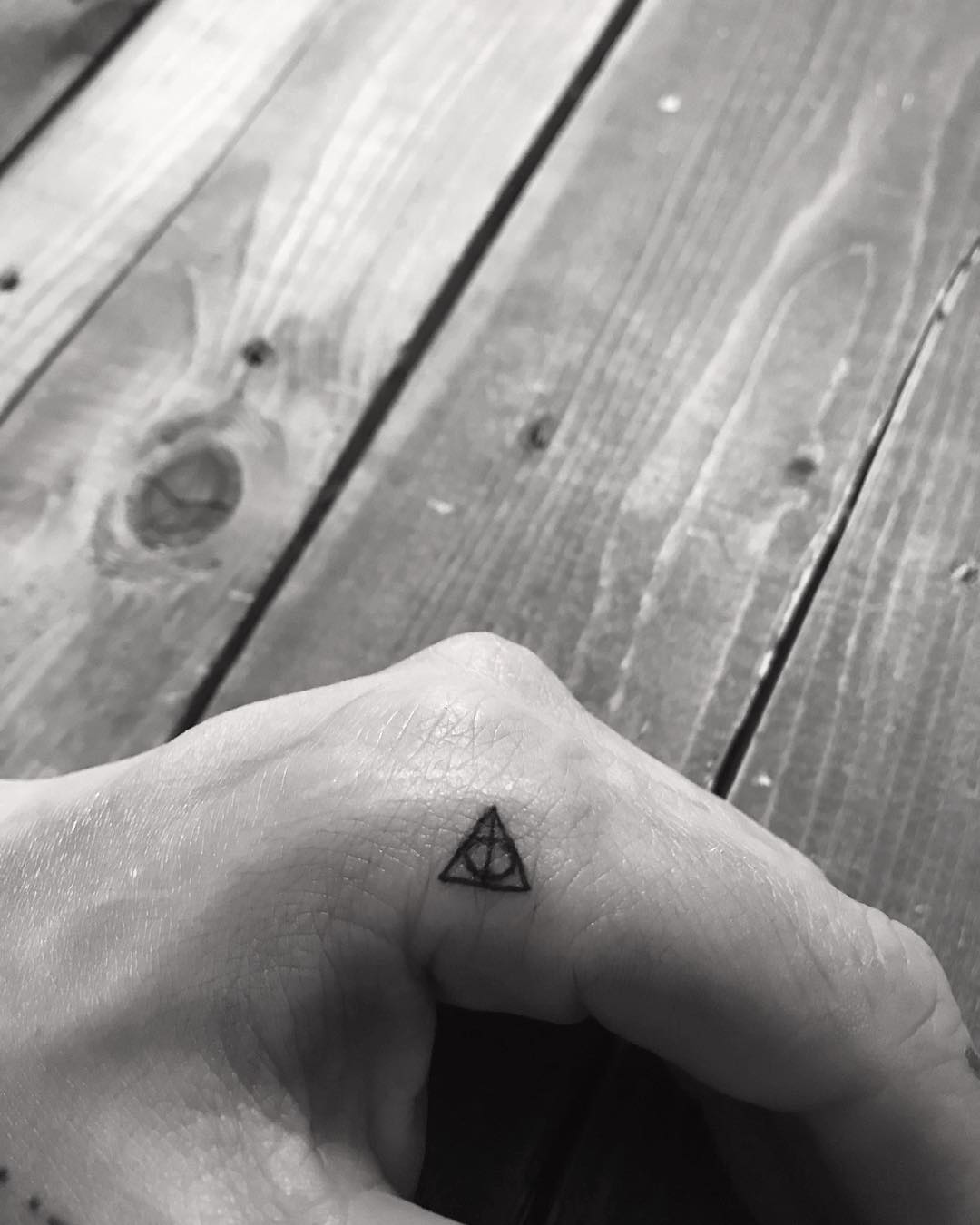 Miniature Harry Potter Death Hallow Tattoo On Finger