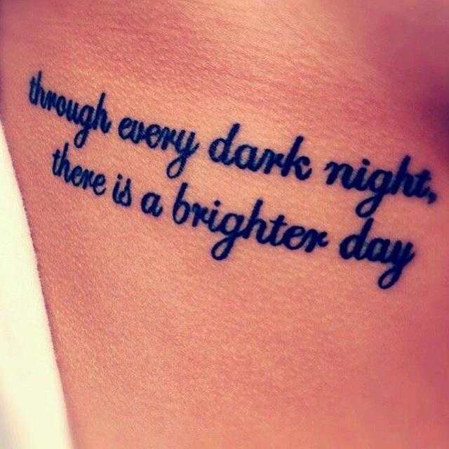 Positive Quote Tattoo In Bold Letters On Ribs