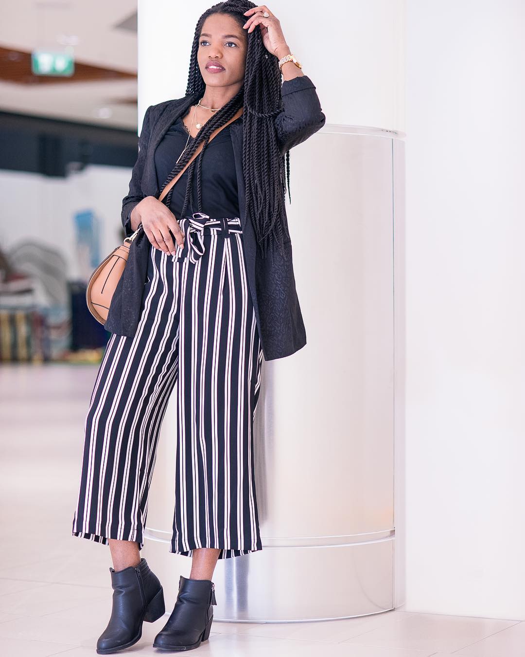 Ravishing Stripes Trouser With Black Top. Shrug And Leather Shoes