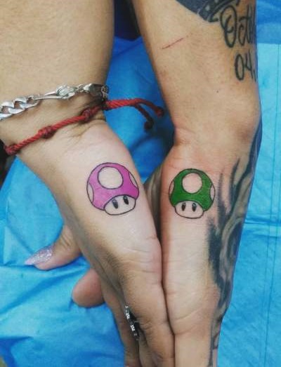 Alluring Colored Mushroom Couple Tattoo Design